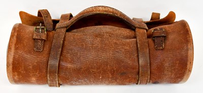 Lot 645 - A set of three bowling balls or woods, in a...