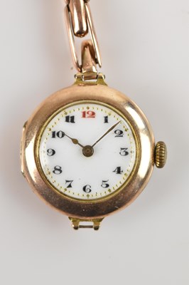Lot 539 - A lady's 9ct gold cased wristwatch, the enamel...