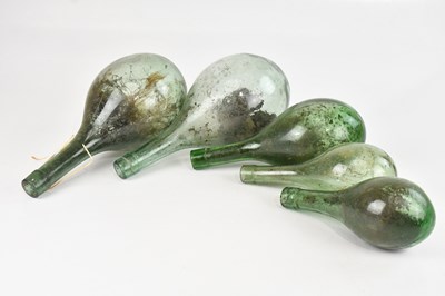 Lot 1788 - Five 19th century green moulded glass bottles,...