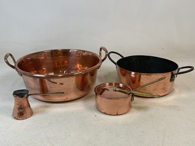 Lot 312 - A copper jam/preserve pan, together with a...