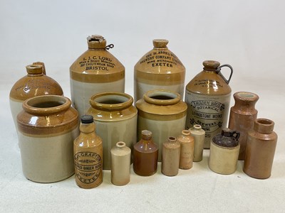 Lot 412 - A collection of stoneware flagons, jars and...