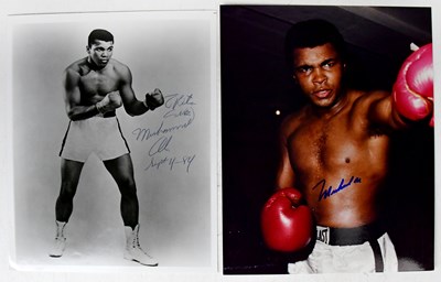 Lot 566 - MUHAMMED ALI; a signed black and white...