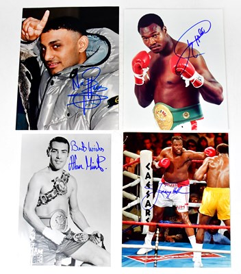Lot 558 - BOXING; two signed colour photographs of Larry...