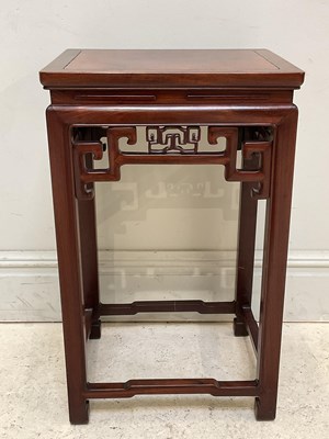 Lot 48 - A reproduction Chinese carved rosewood...
