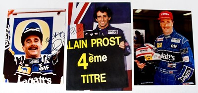 Lot 592 - NIGEL MANSELL; two signed colour photographs...