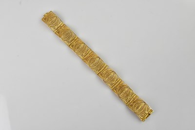Lot 1113 - An Indian yellow metal filigree bracelet, set...