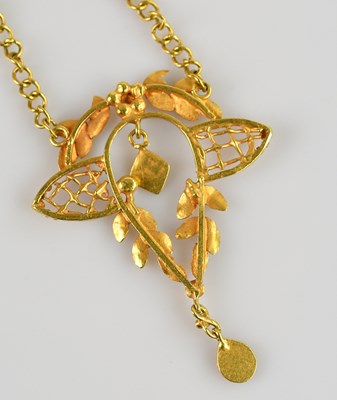 Lot 2019 - An eastern yellow metal pendant suspended on a...