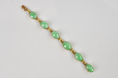 Lot 1167 - A Chinese yellow metal and green hardstone...