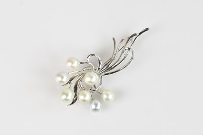 Lot 1290 - A Chinese white metal and pearl set brooch,...