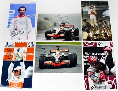 Lot 598 - LEWIS HAMILTON; six signed colour photographs...