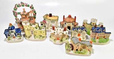 Lot 548 - STAFFORDSHIRE; a collection of ceramic cottages, house and buildings