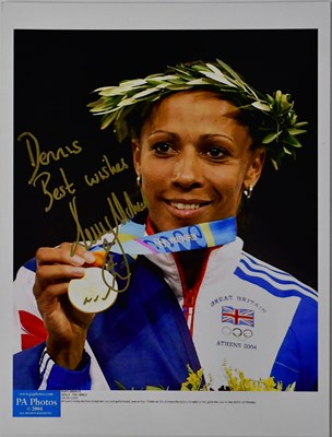 Lot 634 - KELLY HOLMES; four signed PA Photos colour...