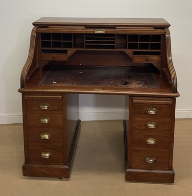 Lot 759 - An early 20th century mahogany tambour roll...