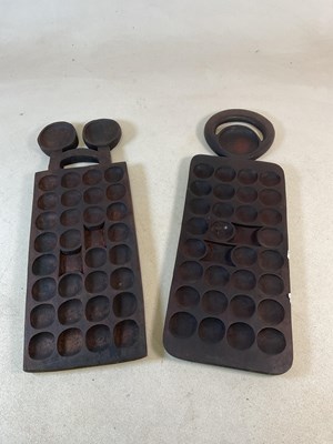 Lot 352 - Two African wooden Mancala boards, lengths...