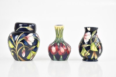Lot 1599 - MOORCROFT; a small ginger jar and cover in the...
