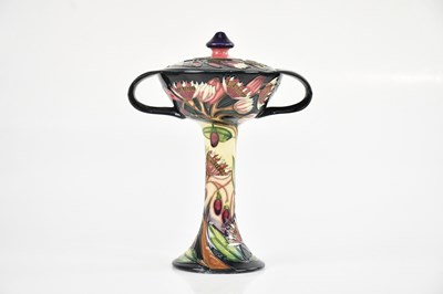 Lot 1587 - EMMA BOSSONS FOR MOORCROFT; a twin handled...