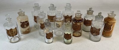 Lot 170 - Eleven large clear glassapothecary jars...