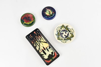 Lot 1602 - WALTER MOORCROFT; two ceramic lids, including...
