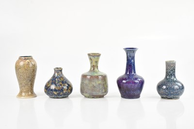 Lot 1591 - COBRIDGE; five ceramic vases, each decorated...