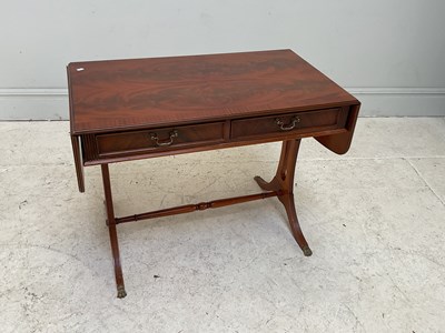 Lot 75 - A reproduction mahogany two drawer sofa table,...