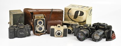 Lot 1807 - A collection of cameras including Polaroid,...
