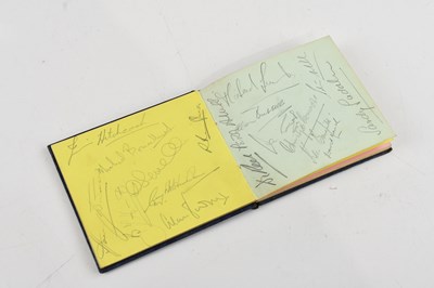 Lot 1516 - An autograph book containing signatures of...
