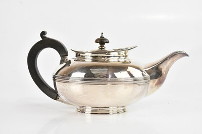 Lot 105 - A George IV hallmarked silver teapot, with...
