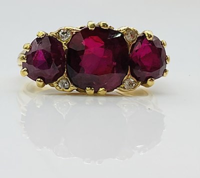 Lot 775 - An antique yellow metal ruby and diamond ring,...
