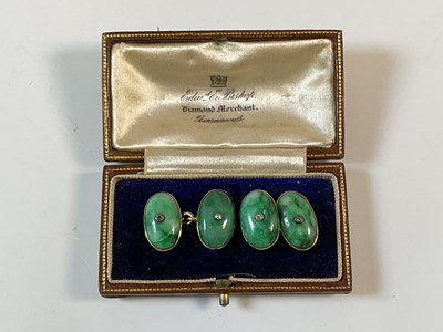 Lot 778 - A pair of yellow metal and jade diamond set...