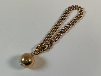 Lot 780 - A very unusual yellow metal orb, opening with...