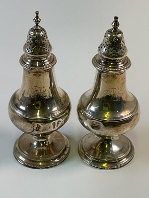 Lot 501 - A pair of Victorian hallmarked silver peppers,...