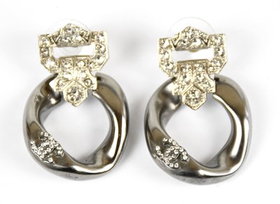 Lot 821 - CHANEL; a pair of gun metal tone pierced...
