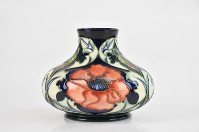 Lot 1226 - MOORCROFT; a 'Poppy' pattern bulbous vase,...