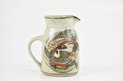 Lot 1242 - COLIN KELLAM; a studio pottery jug decorated...