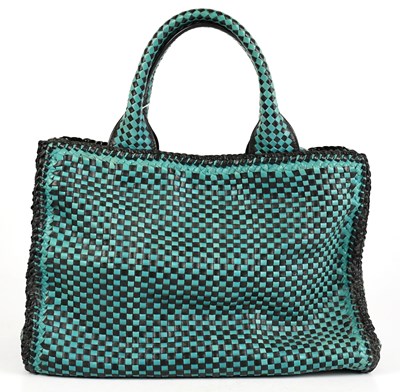 Lot 670 - PRADA; a turquoise blue and black woven...