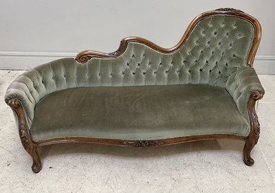 Lot 110 - A Victorian carved mahogany chaise longue,...