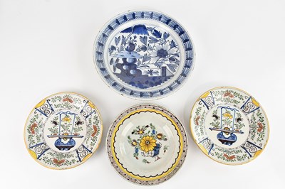 Lot 1699 - A near pair of 18th century tin glazed...