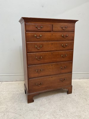 Lot 40 - A 19th century tall oak chest of two short...