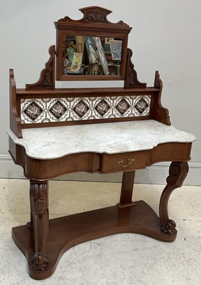 Lot 135 - A Victorian carved walnut duchess type...