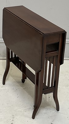 Lot 310 - An Edwardian inlaid mahogany Sutherland table,...