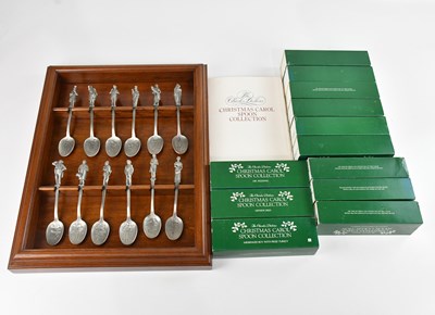 Lot 389 - Two sets of Christmas Carol spoons from the...
