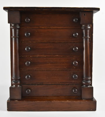Lot 34 - A Victorian mahogany tabletop Wellington chest...