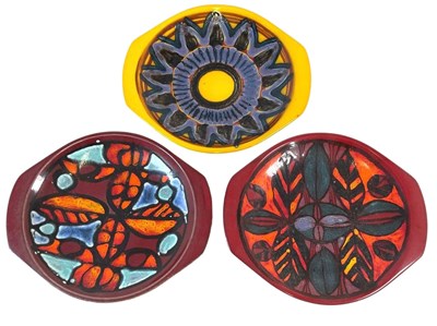 Lot 358 - POOLE POTTERY; three Delphis shaped shallow...