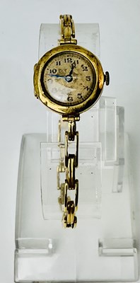 Lot 697 - A lady's vintage 9ct yellow gold wristwatch...