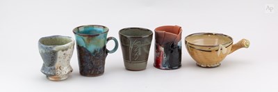 Lot 754 - A group of stoneware, porcelain and slipware...