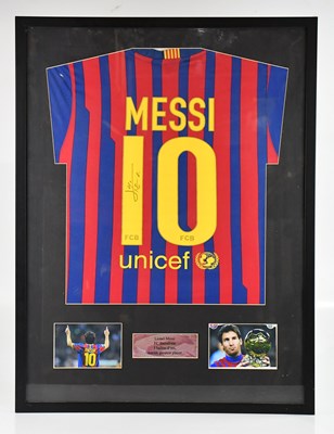 Lot 1456 - LIONEL MESSI; an autographed replica Barcelona...