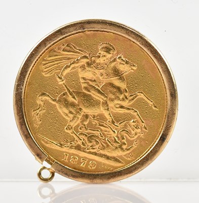 Lot 584 - A Victorian full sovereign, 1879, young head,...