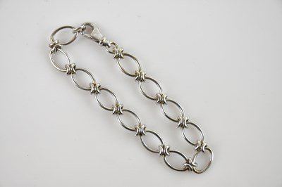 Lot 533 - A 9ct white gold bracelet, length 18.5cm,...