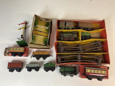 Lot 149 - HORNBY; a quantity of O gauge trainset and...