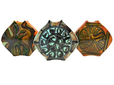 Lot POOLE POTTERY; three 'Packet of Crisps' shaped...